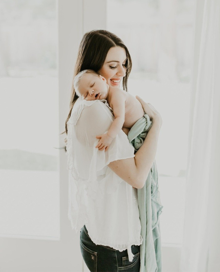 woman holding a baby